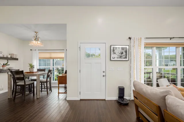 a view of a livingroom with furniture and wooden floor