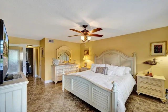 a kitchen with a sink cabinets and a stove