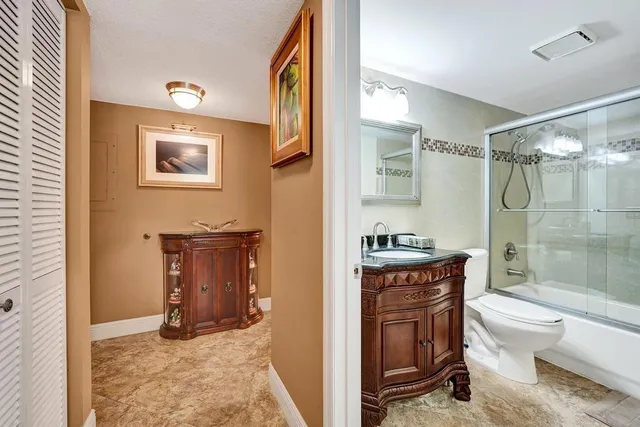 a view of a swimming pool with an outdoor seating and a garden