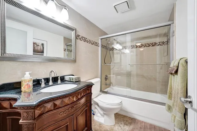 a view of a golf course with a lake