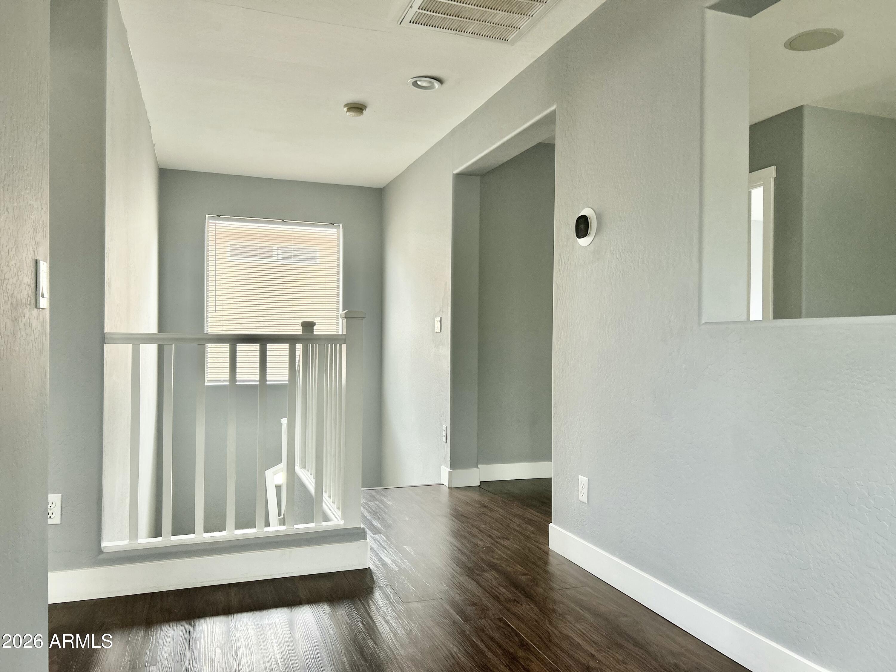 451 South Hawes Road, Unit 43 Mesa, AZ 85208 - Photo 12 of 23 a view of wooden floor in a room