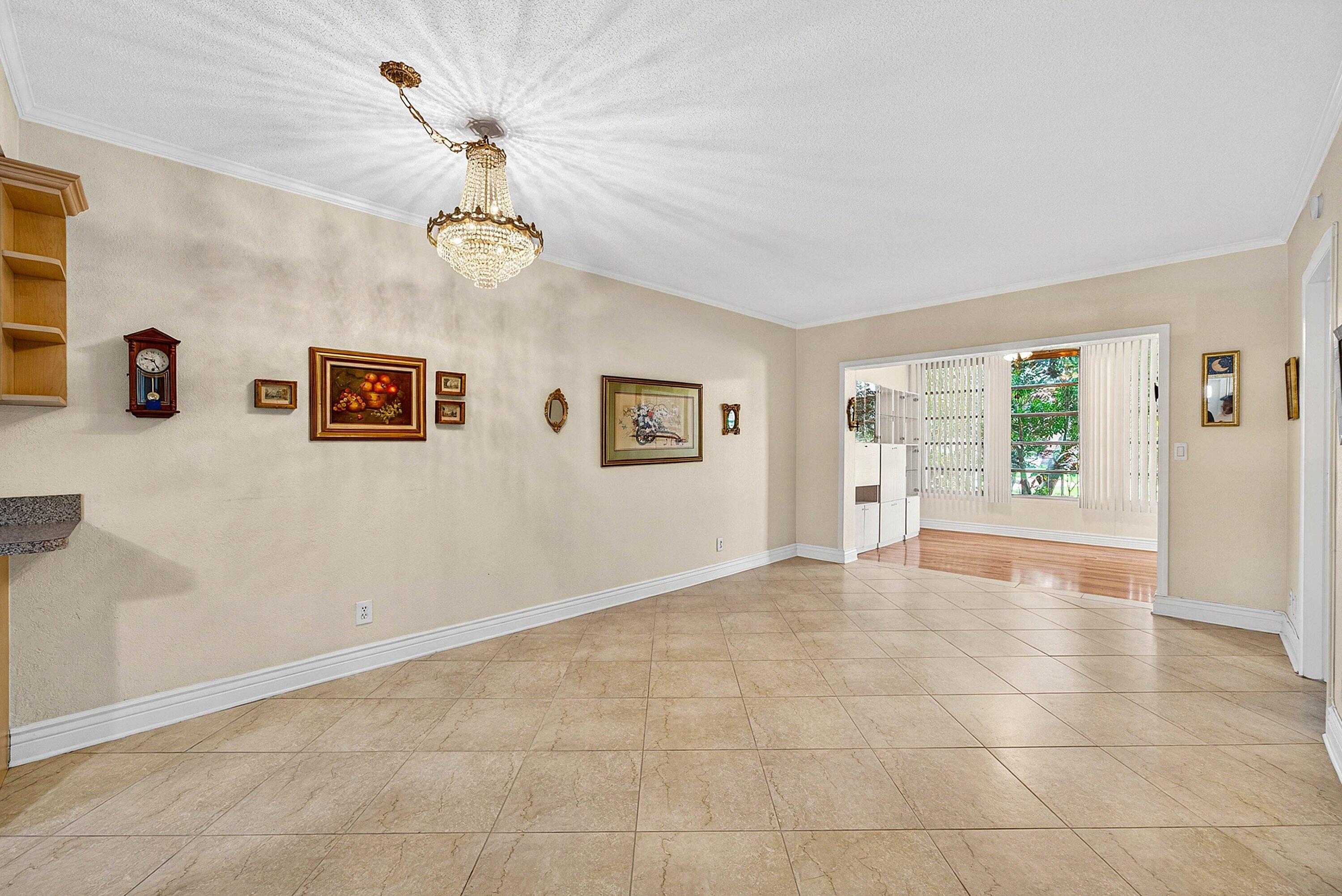 300 Northeast 20th Street, Unit 308 Boca Raton, FL 33431 - Photo 12 of 40 a view of an empty room with a window