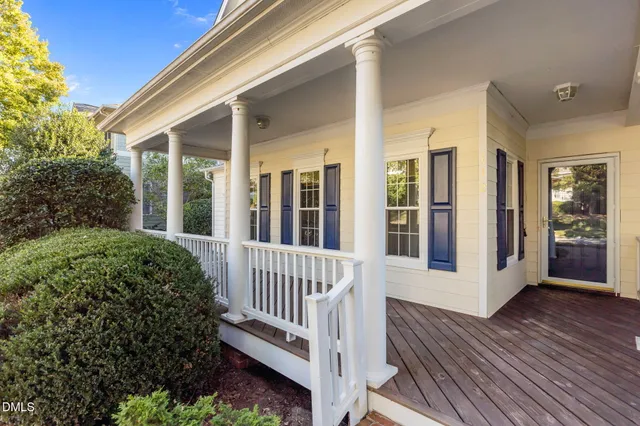 a view of a house with porch and wooden floor