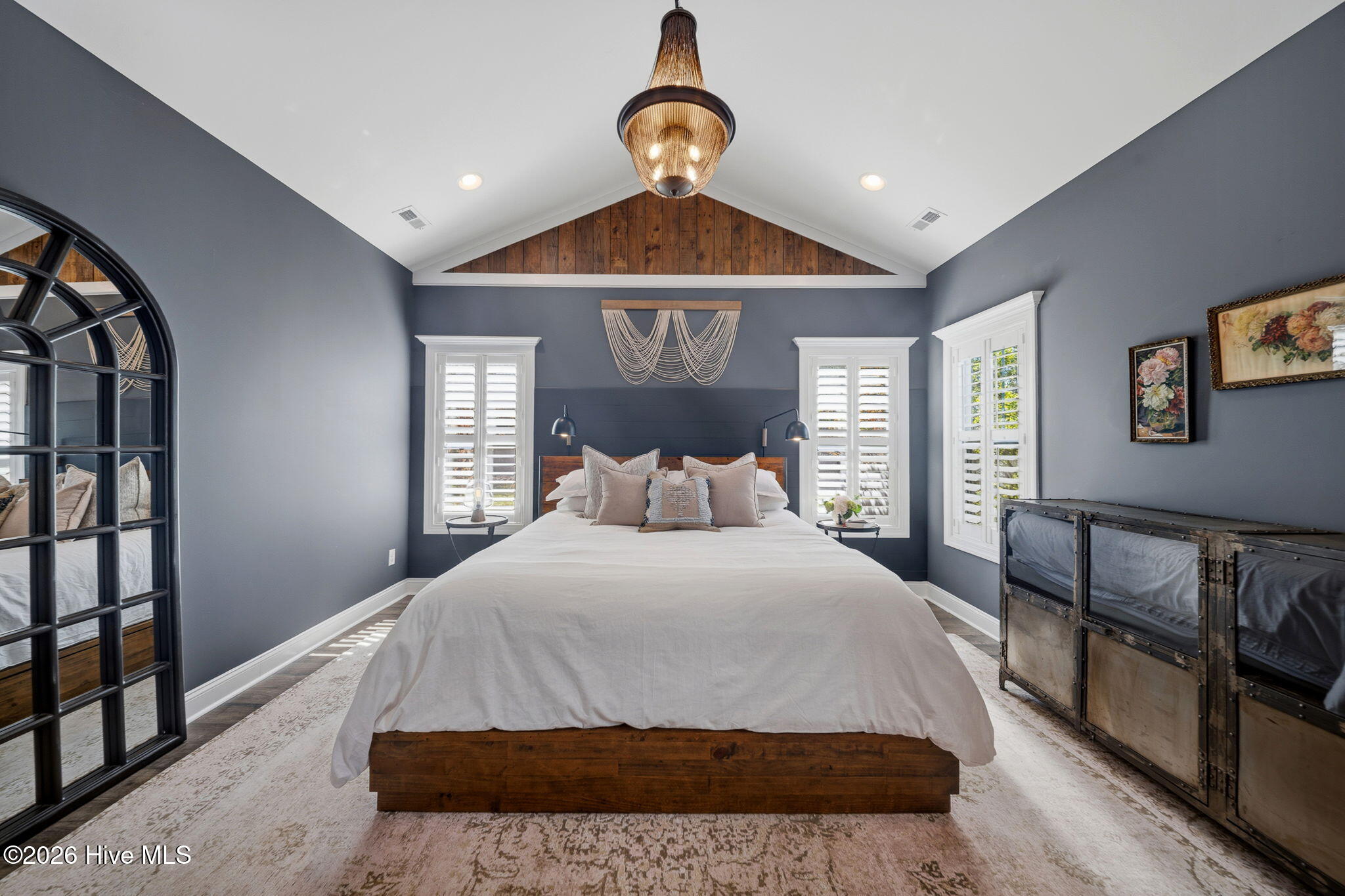 88 South Lamplighters Walk Hampstead, NC 28443 - Photo 8 of 34 First Floor Primary Homeowner's Suite featuring unique shiplap detail and designer lighting