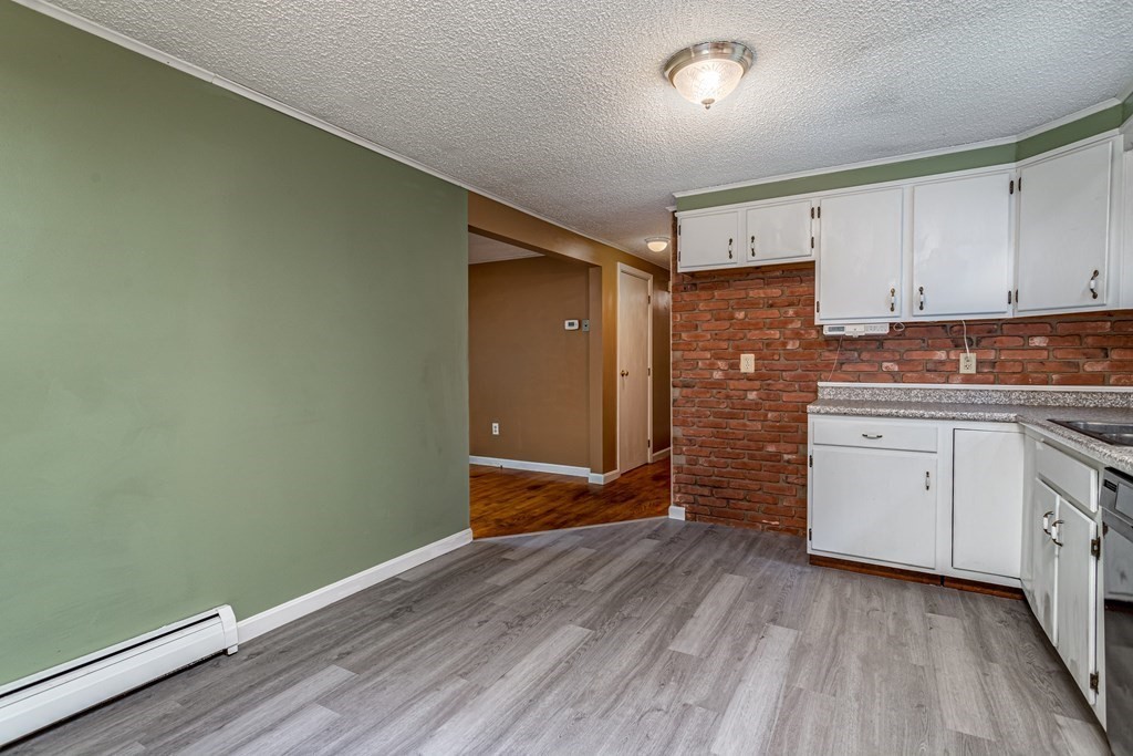 123 Dunn Road Ashburnham, MA 01430 - Photo 13 of 42 a view of kitchen with wooden floor and electronic appliances