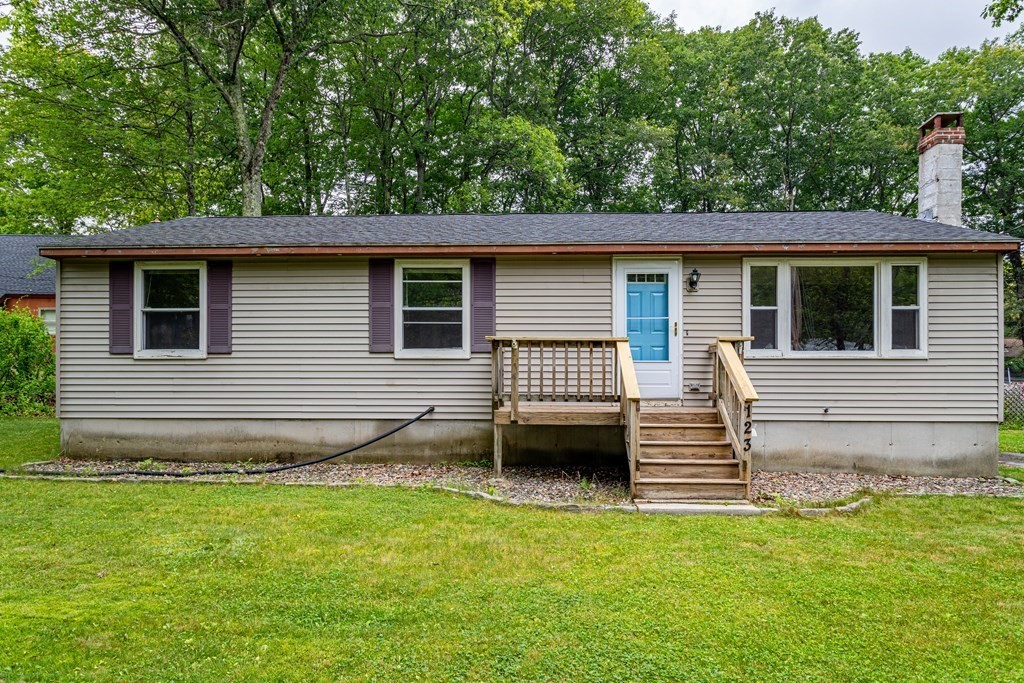 123 Dunn Road Ashburnham, MA 01430 - Photo 2 of 42 a view of a house with a backyard