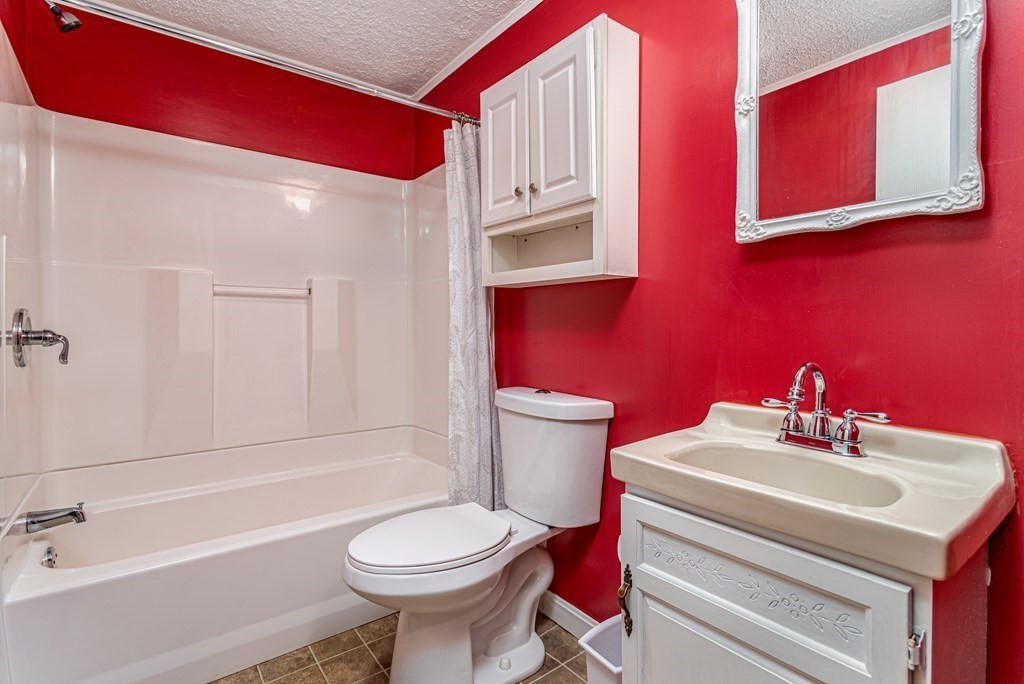 123 Dunn Road Ashburnham, MA 01430 - Photo 21 of 42 a bathroom with a sink toilet and shower