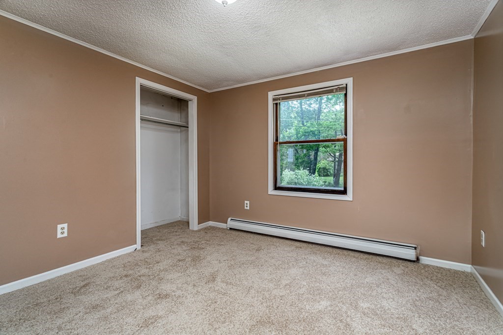 123 Dunn Road Ashburnham, MA 01430 - Photo 25 of 42 an empty room with windows