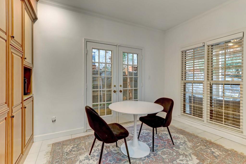 3520 Vinings Ridge Court Atlanta, GA 30339 - Photo 16 of 52 a view of a dining room with furniture window and wooden floor