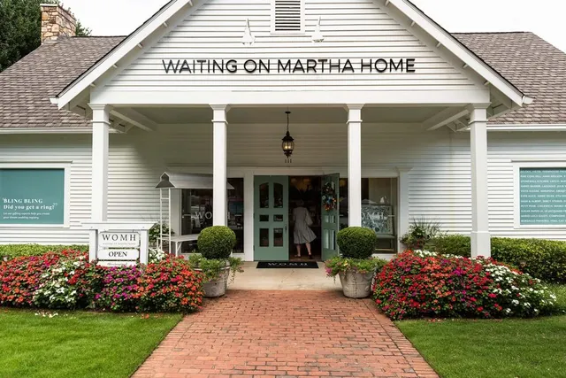 a sign that is on a brick wall