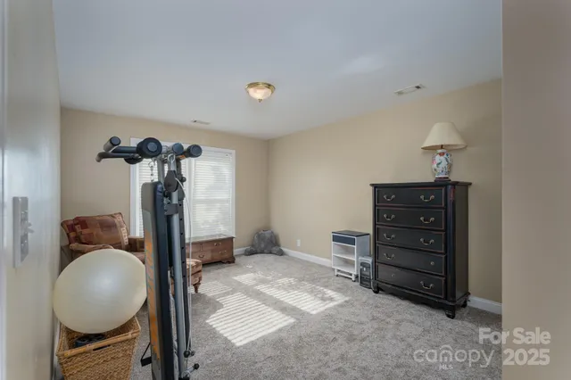 a view of a livingroom with furniture