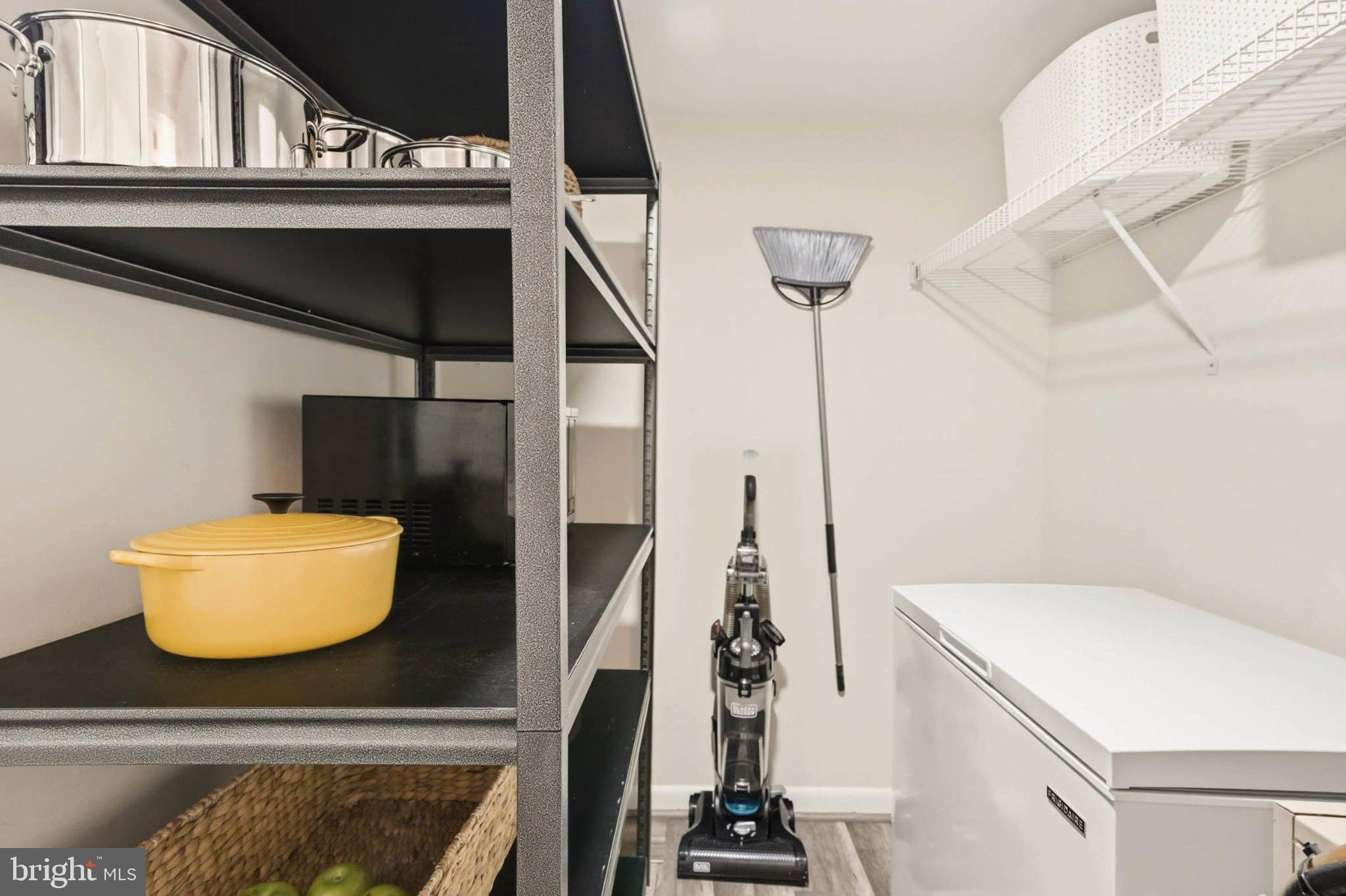 17816 Buehler Road, Unit 1B1 164 Olney, MD 20832 - Photo 22 of 29 Organized utility space with modern shelves.