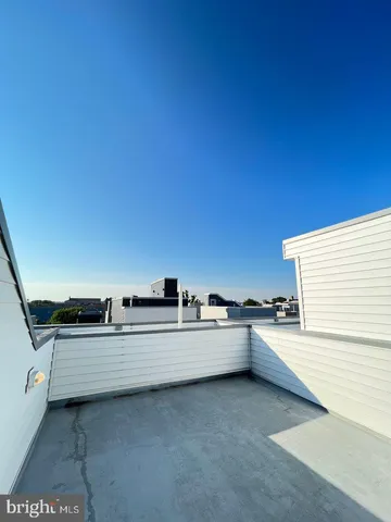 a kitchen with stainless steel appliances a sink and cabinets