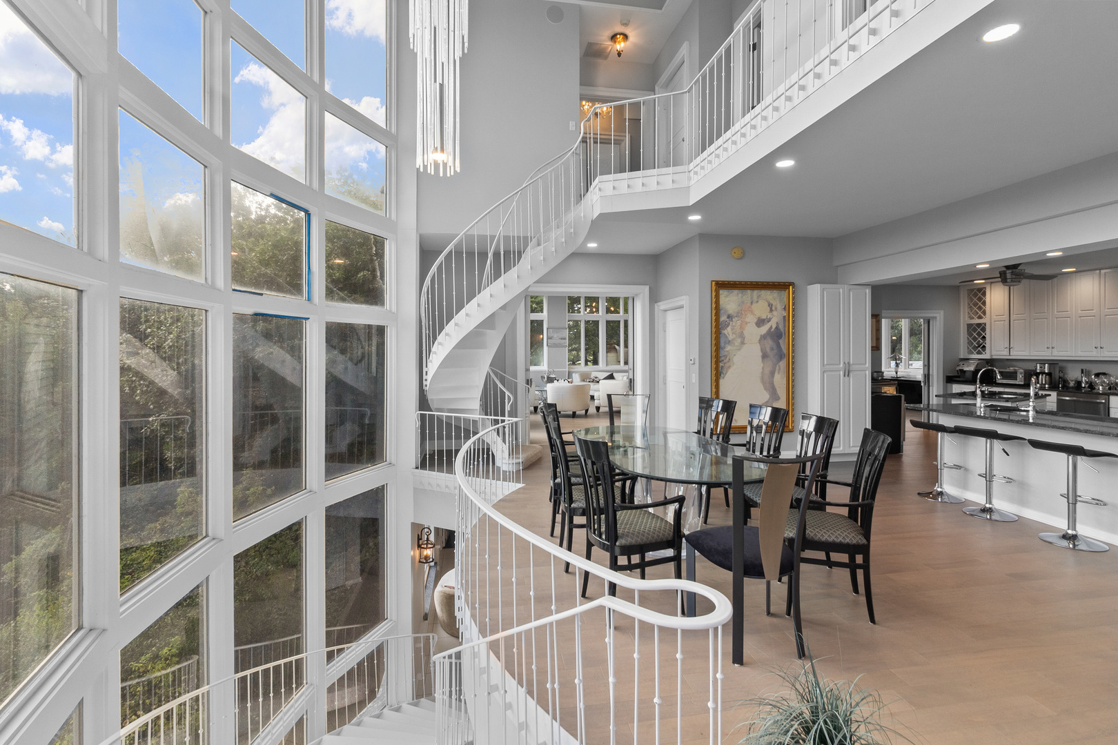 7830 North Pillow Hill Road Spring Grove, IL 60081 - Photo 29 of 69 a view of a dining room with furniture and a chandelier