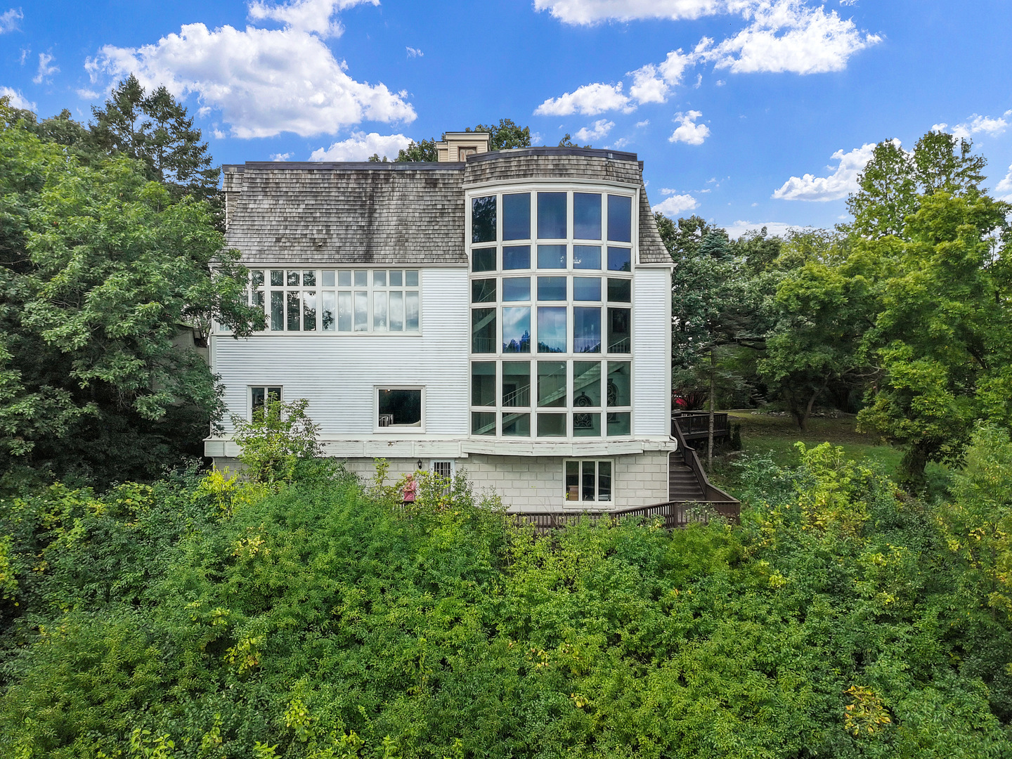7830 North Pillow Hill Road Spring Grove, IL 60081 - Photo 3 of 69 a view of a house with a yard and sitting area