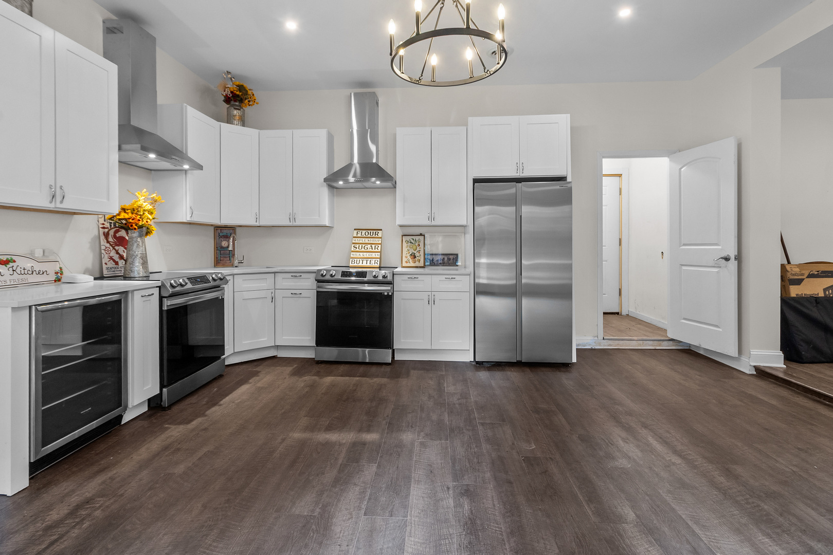 7830 North Pillow Hill Road Spring Grove, IL 60081 - Photo 55 of 69 a kitchen with stainless steel appliances a stove a sink dishwasher a refrigerator and a fireplace