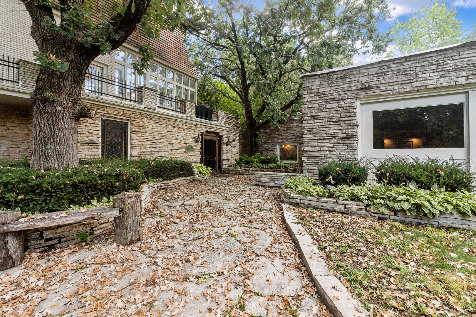 7830 North Pillow Hill Road Spring Grove, IL 60081 - Photo 10 of 69 a view of a house with a yard and potted plants