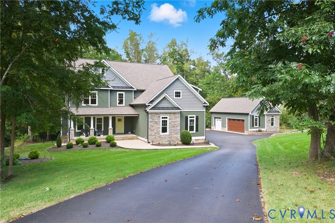 12600 Lerwick Place Chesterfield, VA 23838 - Photo 2 of 47 a front view of a house with garden