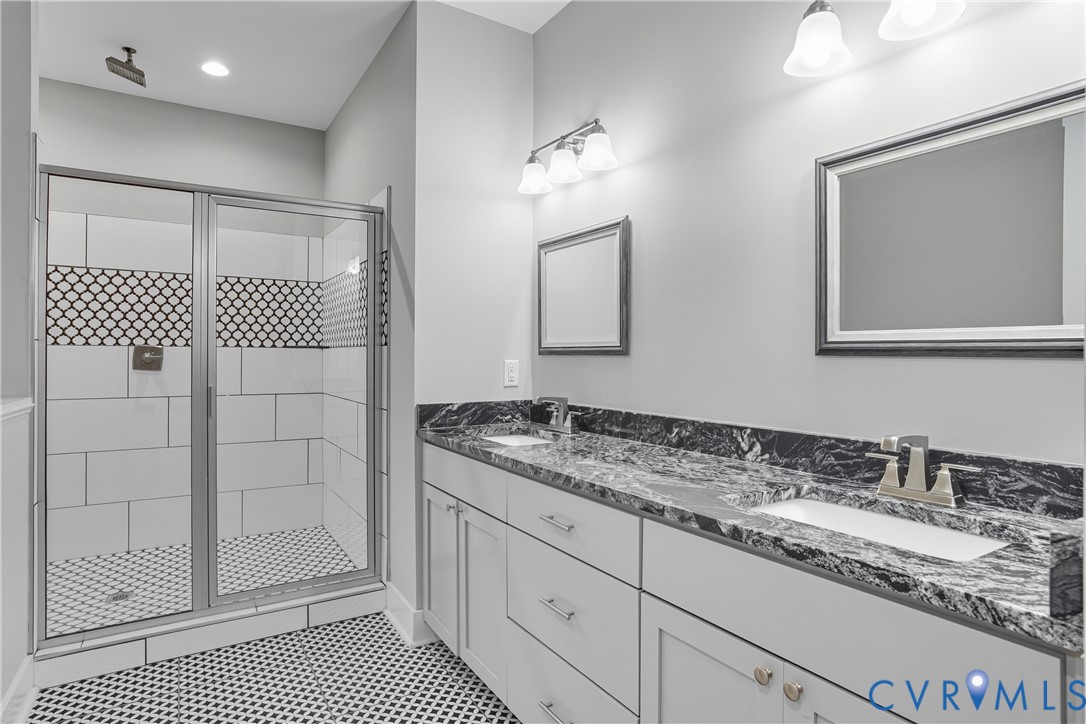 12600 Lerwick Place Chesterfield, VA 23838 - Photo 29 of 47 a bathroom with a sink and a mirror