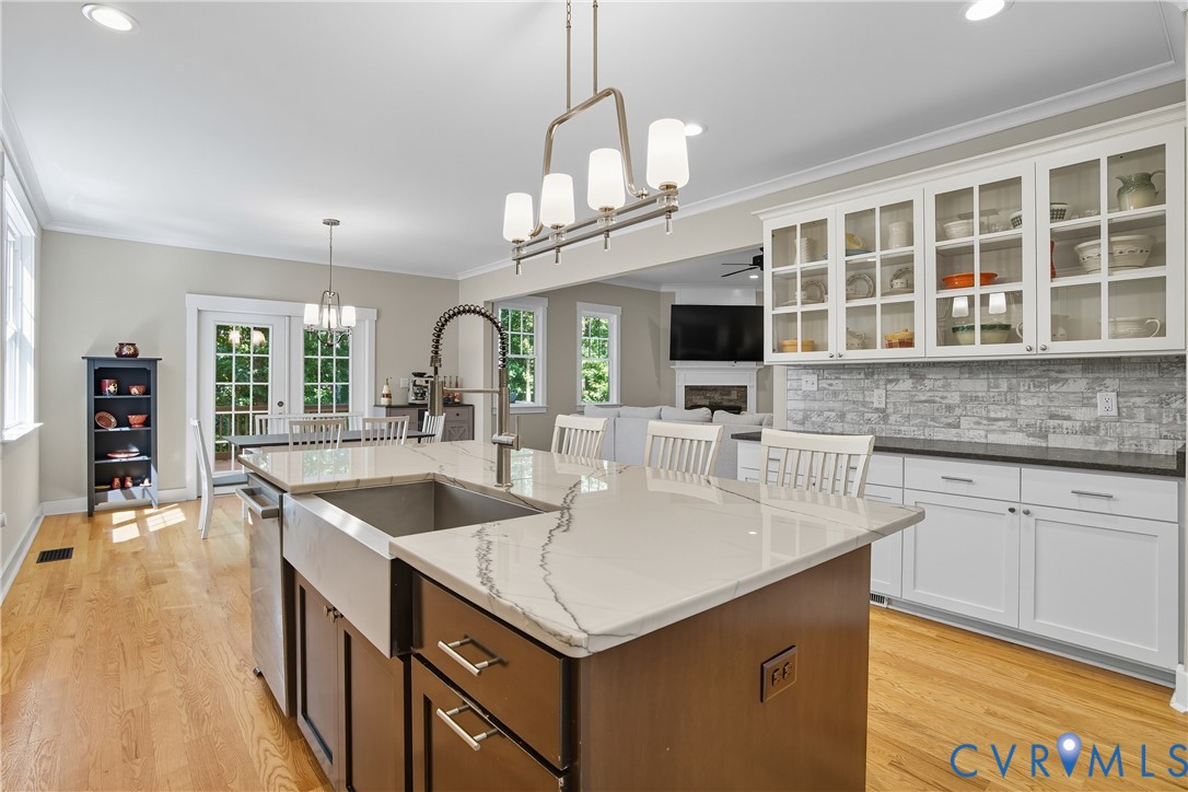 12600 Lerwick Place Chesterfield, VA 23838 - Photo 6 of 47 a kitchen with stainless steel appliances granite countertop a sink and a microwave