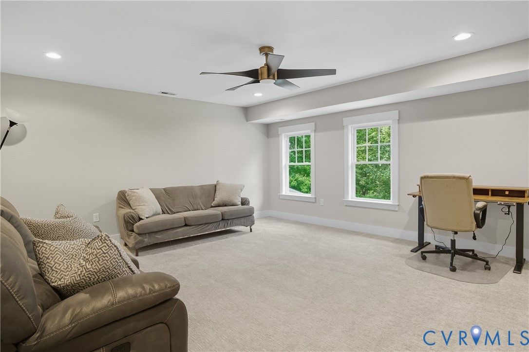 12600 Lerwick Place Chesterfield, VA 23838 - Photo 8 of 47 a living room with furniture and a window