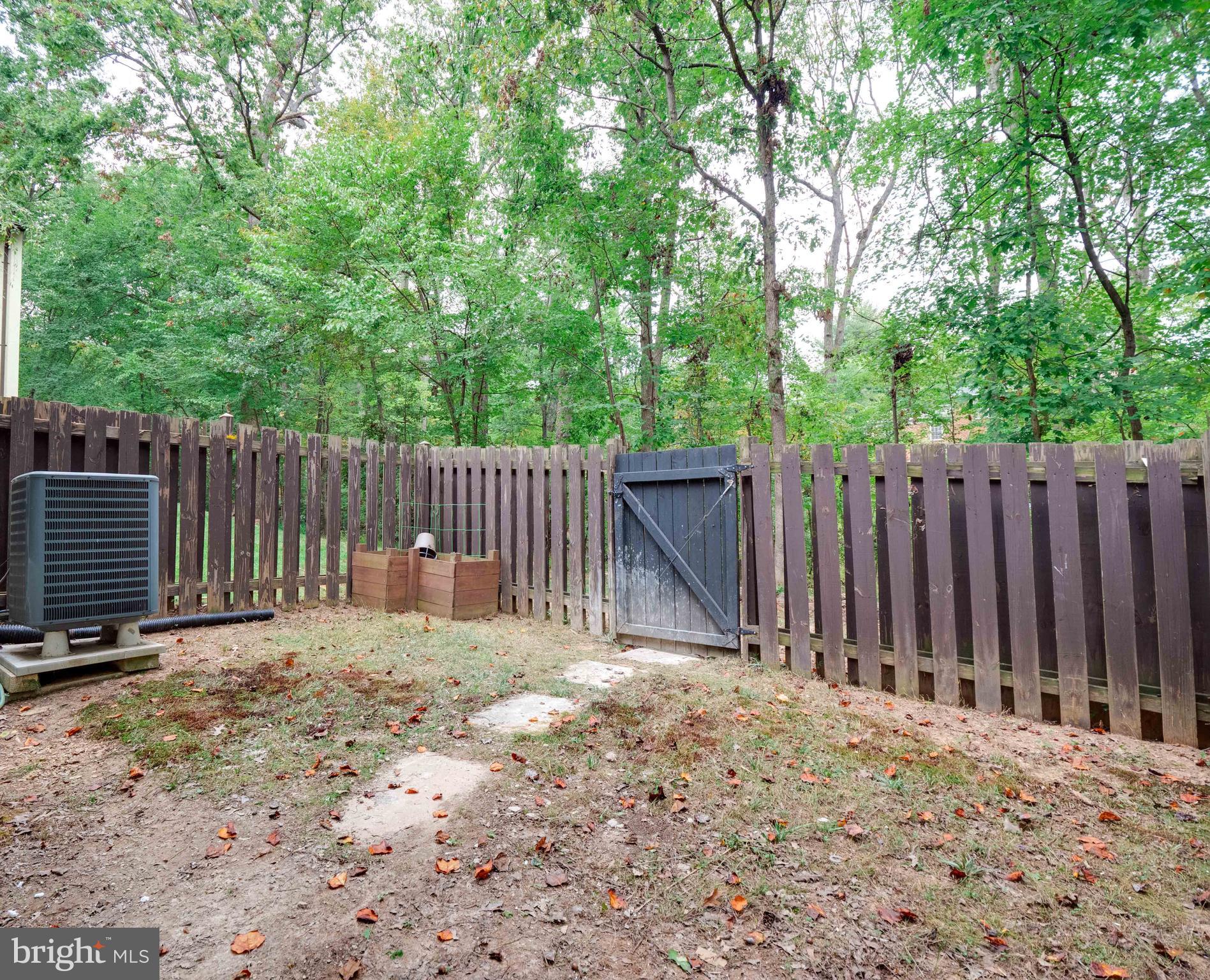 11963 Barrel Cooper Court Reston, VA 20191 - Photo 27 of 33 a view of wooden fence under a large tree