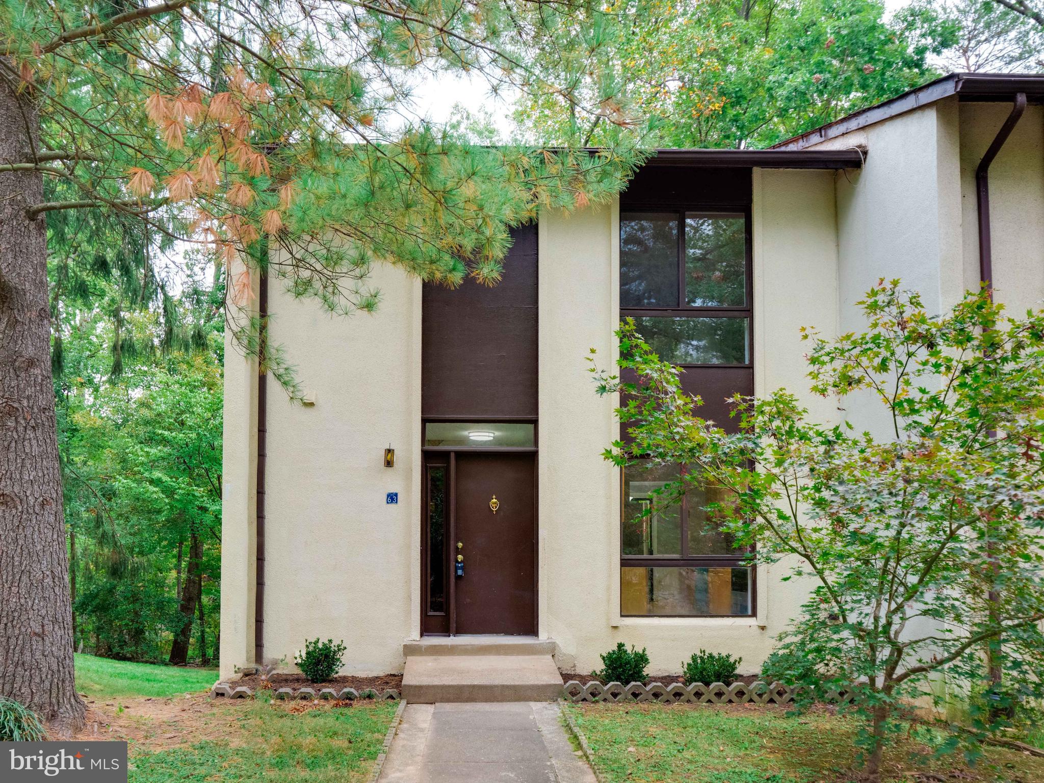 11963 Barrel Cooper Court Reston, VA 20191 - Photo 28 of 33 front view of a house with a yard