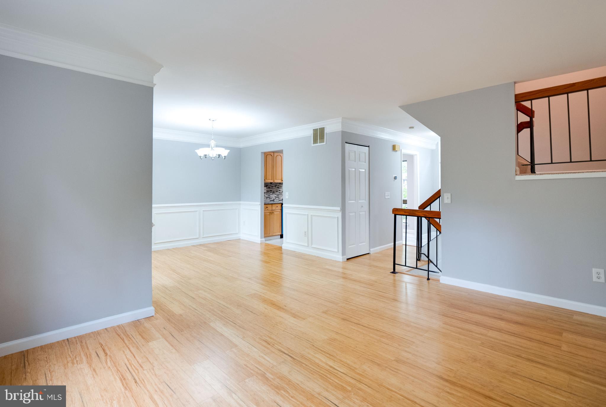 11963 Barrel Cooper Court Reston, VA 20191 - Photo 10 of 33 a view of an empty room with wooden floor and a window