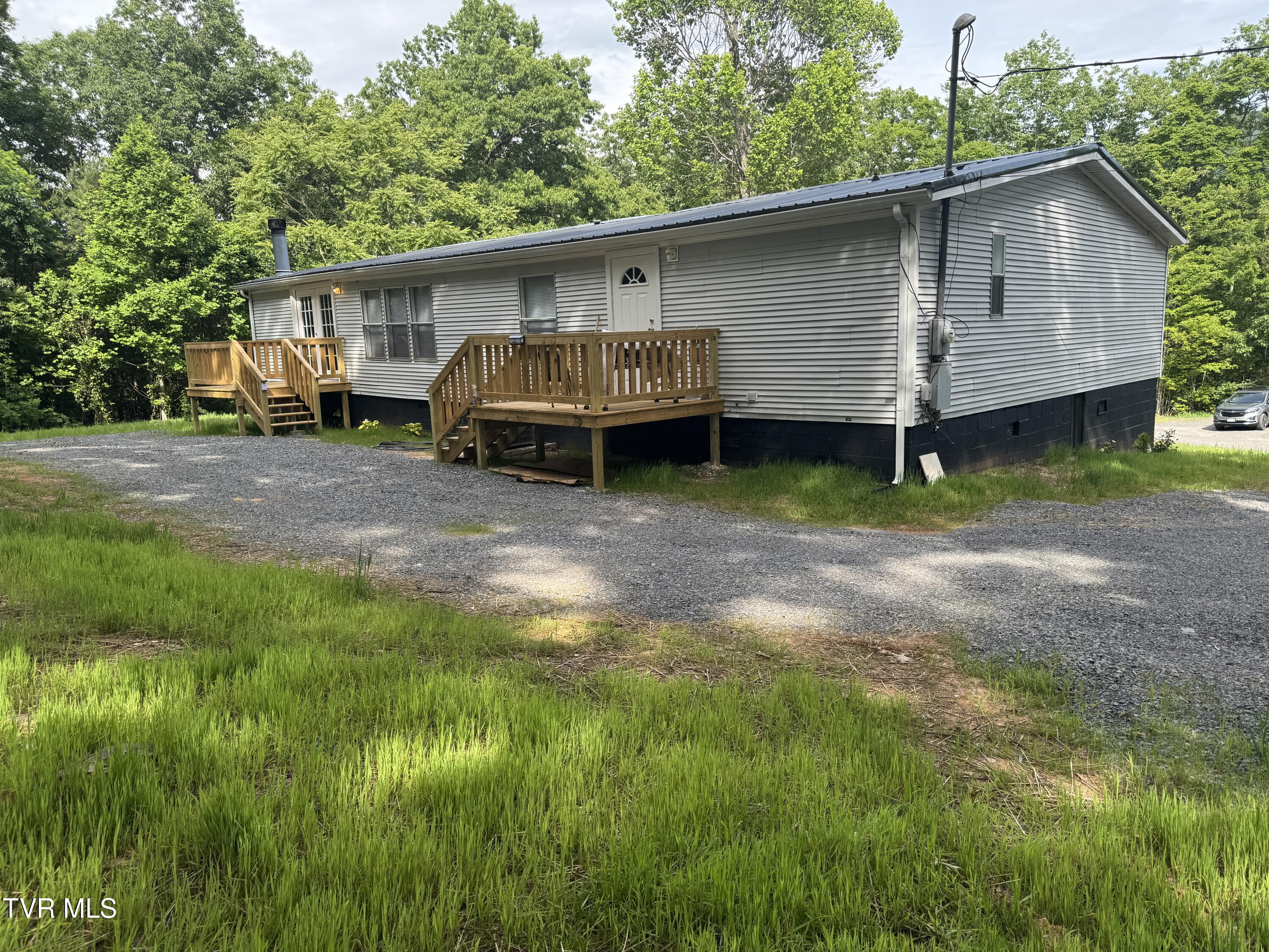 1555 Hamner Hollow Road Big Stone Gap, VA 24219 - Photo 3 of 41 RIGHT REAR CORNER VIEW WITH NEW DECKS