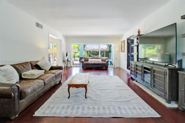 a room with furniture and a window