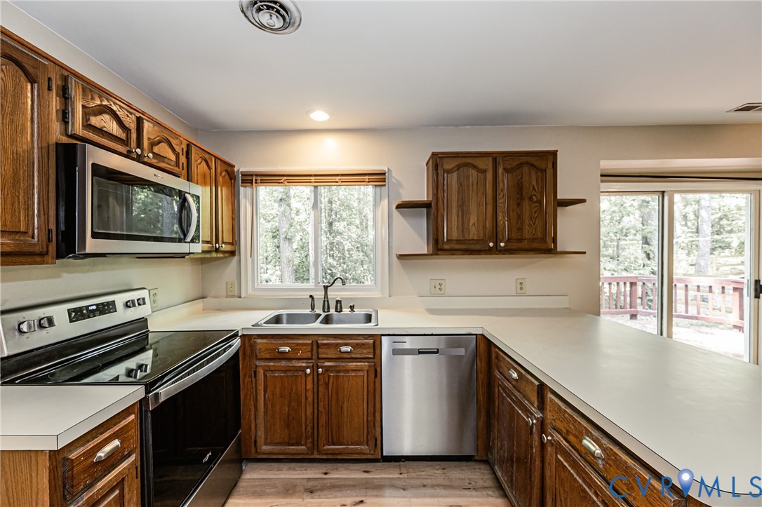 2806 Cove Ridge Road Midlothian, VA 23112 - Photo 33 of 52 Kitchen with wood-finish cabinetry, stainless stee