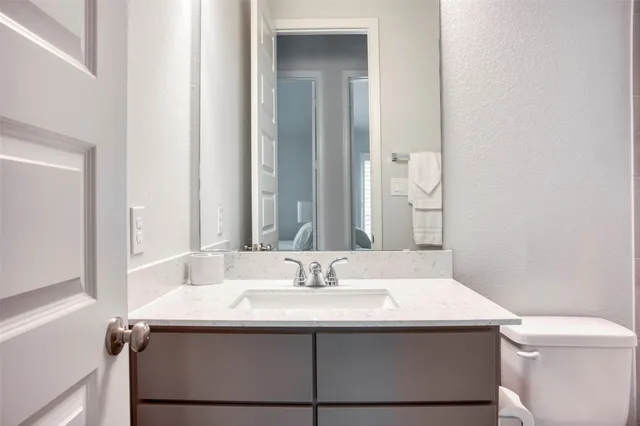 a bathroom with a sink and a toilet