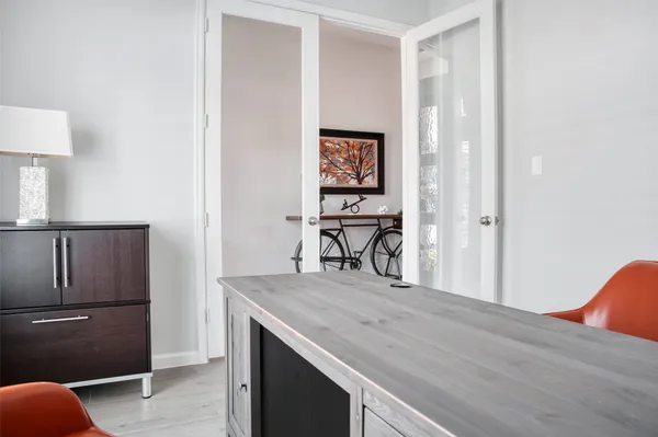 a view of kitchen with furniture and wooden floor