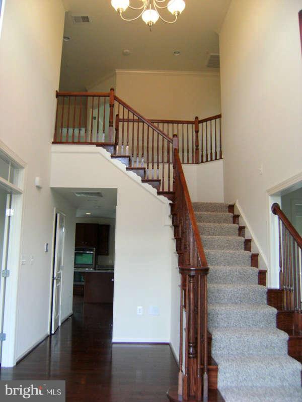 13333 Redspire Drive Silver Spring, MD 20906 - Photo 2 of 30 a view of entryway and hall with wooden floor