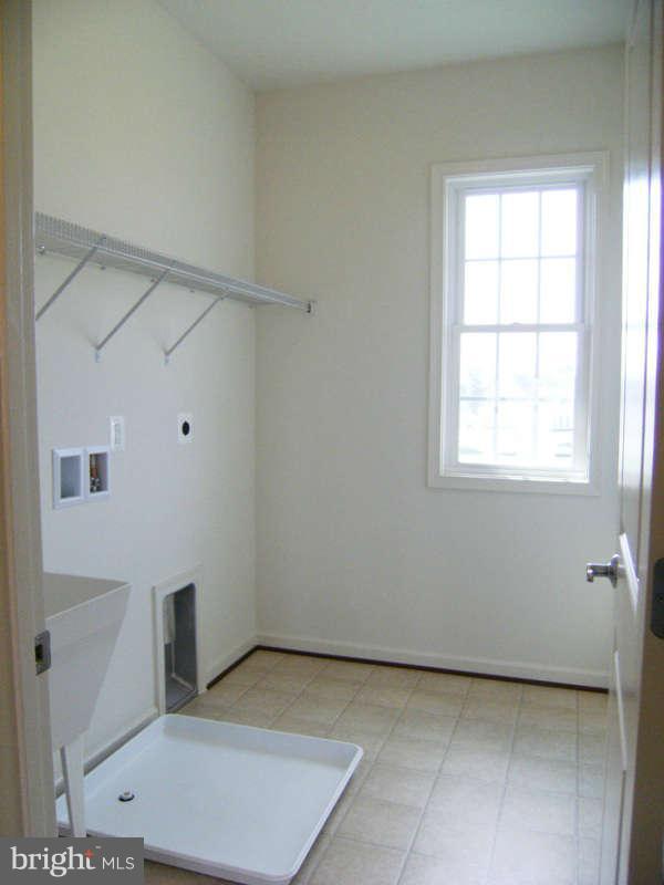 13333 Redspire Drive Silver Spring, MD 20906 - Photo 17 of 30 a view of an empty room with a window