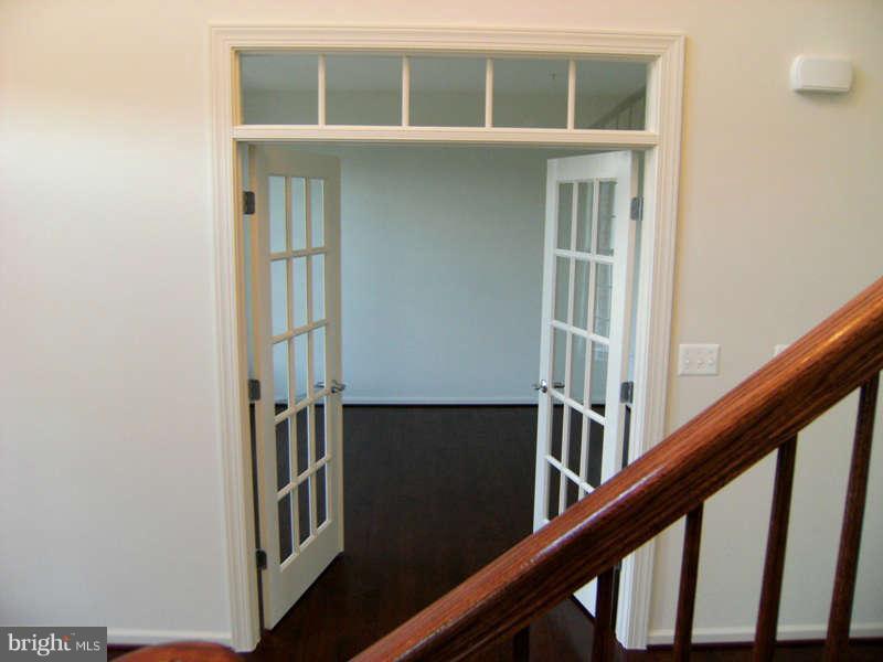 13333 Redspire Drive Silver Spring, MD 20906 - Photo 3 of 30 a view of an entryway with wooden floor