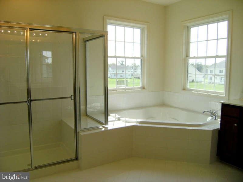 13333 Redspire Drive Silver Spring, MD 20906 - Photo 23 of 30 a bath tub sitting next to a window