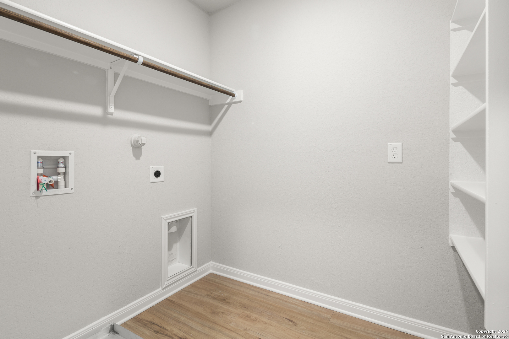 3819 Abbott Pass, Unit 101 St. Hedwig, TX 78152 - Photo 12 of 17 a view of small space with wooden floor