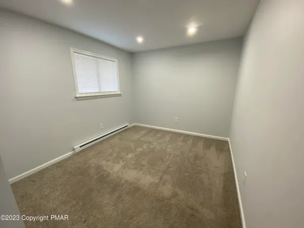 an empty room with a workbench
