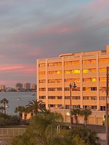 an aerial view of residential house with outdoor space and swimming pool