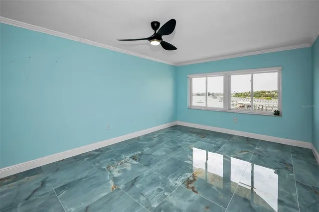 an aerial view of residential houses with outdoor space and swimming pool