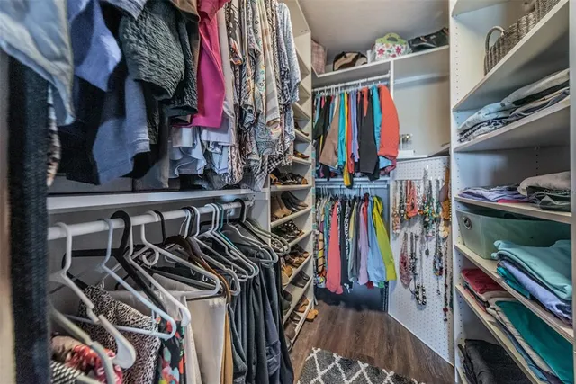 a view of a chair and tables in the park