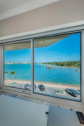 a view of a hallway with washer and dryer
