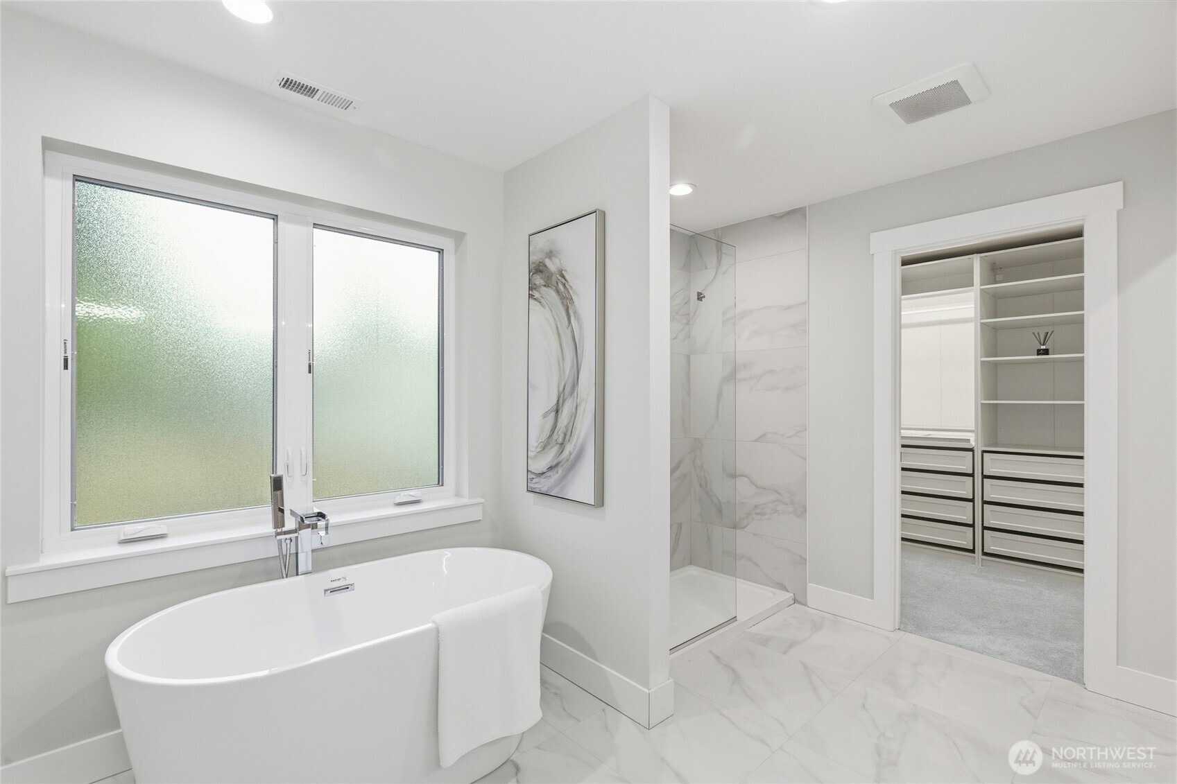 719 Edmonds Way Edmonds, WA 98020 - Photo 21 of 40 a bathroom with a bathtub and a shower