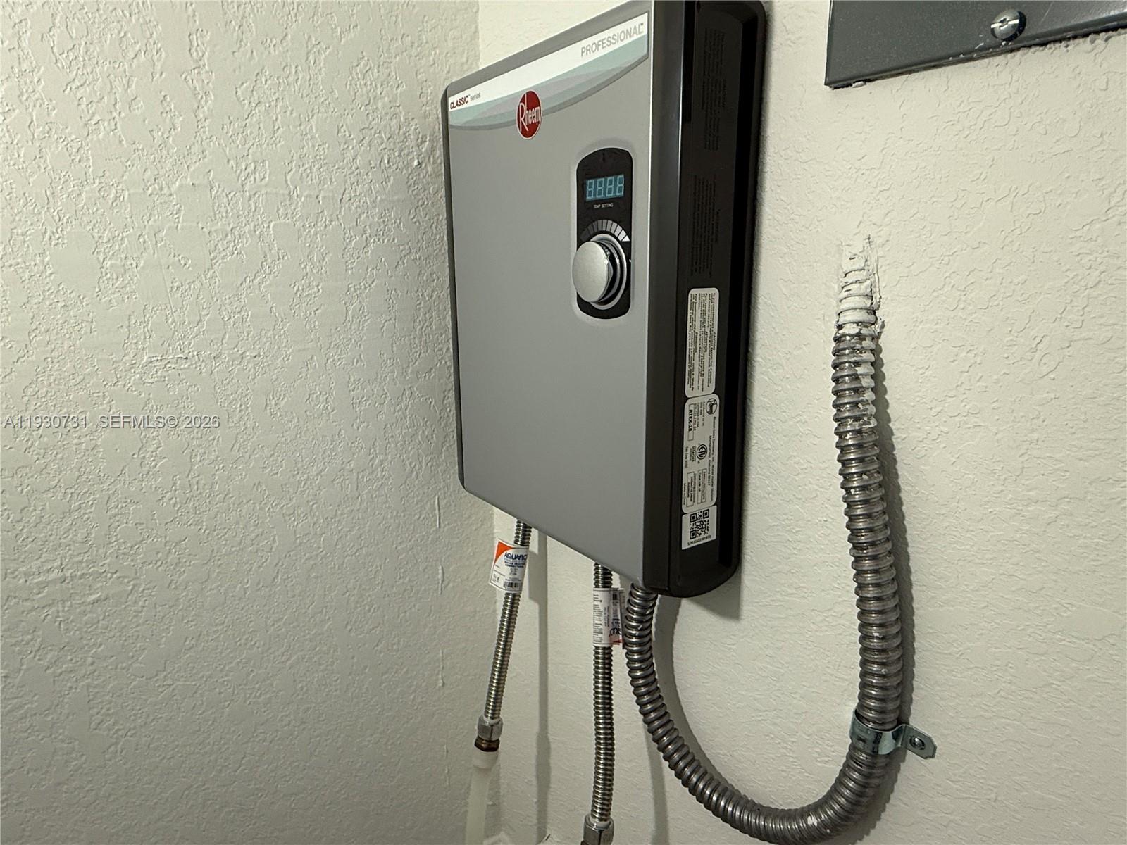 12888 Southwest 233rd Terrace Homestead, FL 33032 - Photo 28 of 32 Rheem Water Heater