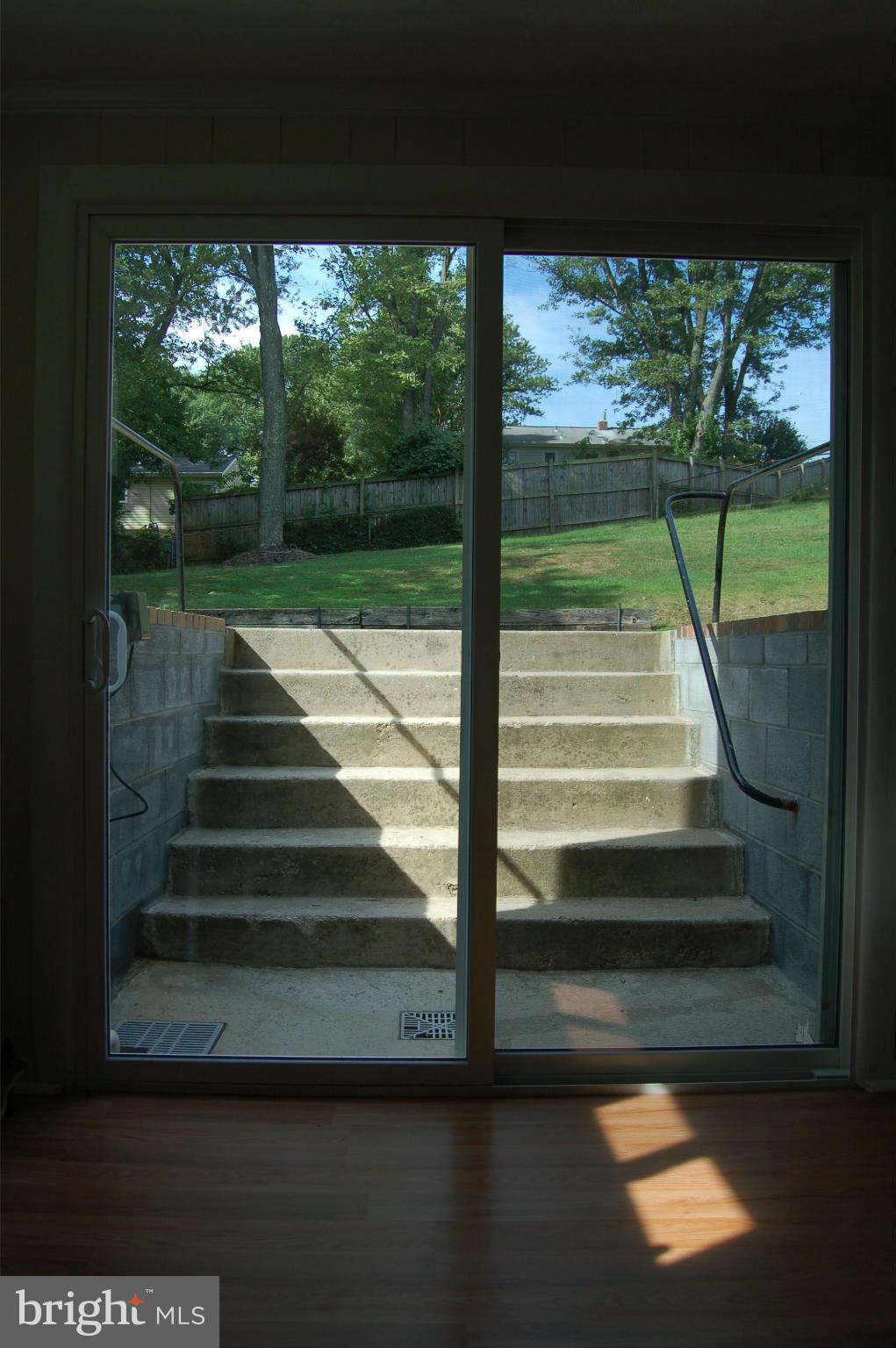 15002 Alaska Road Woodbridge, VA 22191 - Photo 19 of 21 View out to back yard from basement