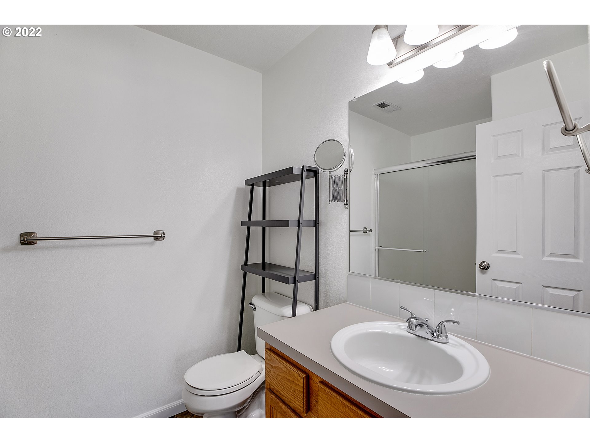 517 Northeast Mariners Loop Portland, OR 97211 - Photo 26 of 30 a bathroom with a sink a toilet and shower