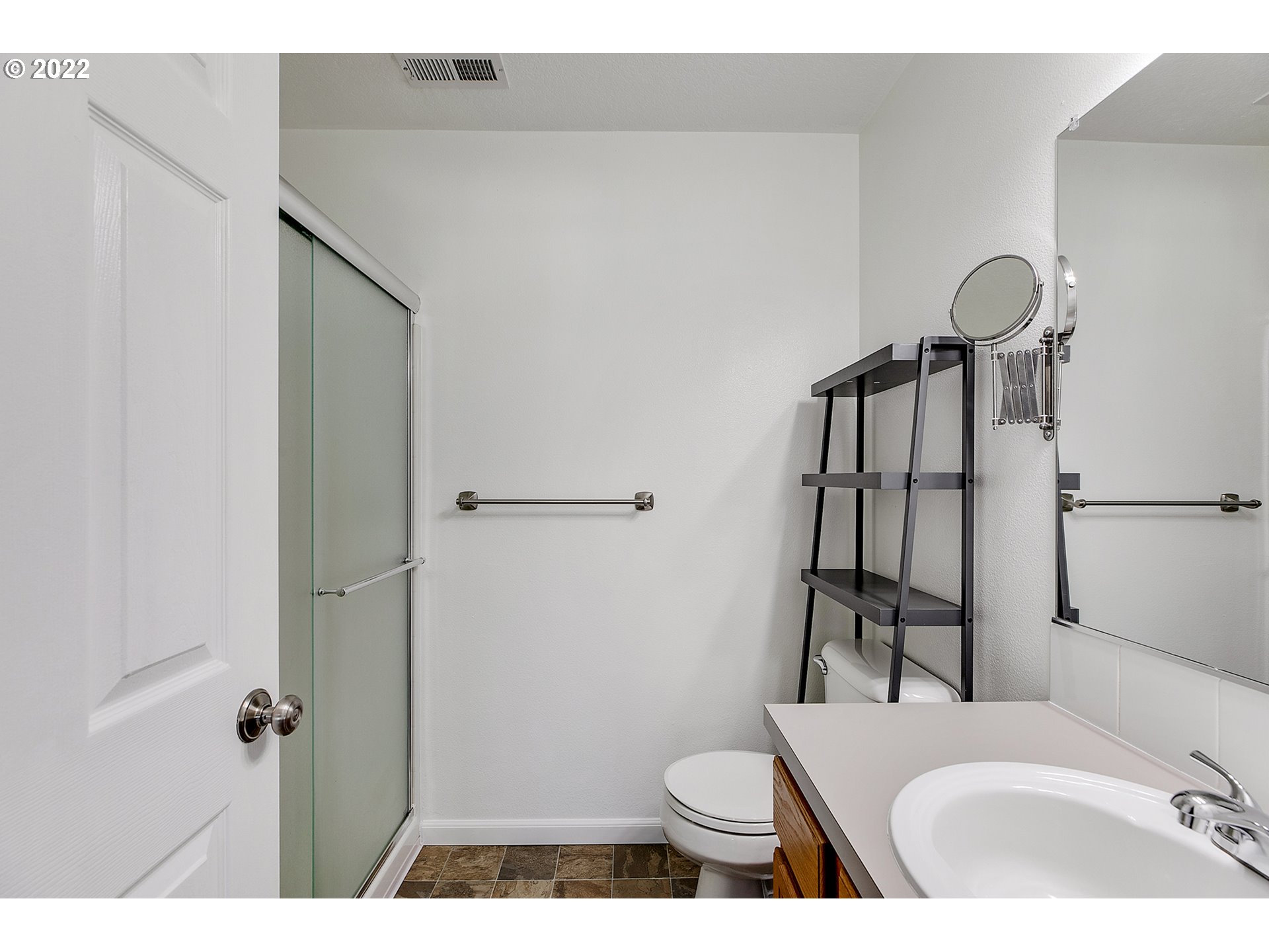 517 Northeast Mariners Loop Portland, OR 97211 - Photo 27 of 30 a bathroom with a sink toilet and shower