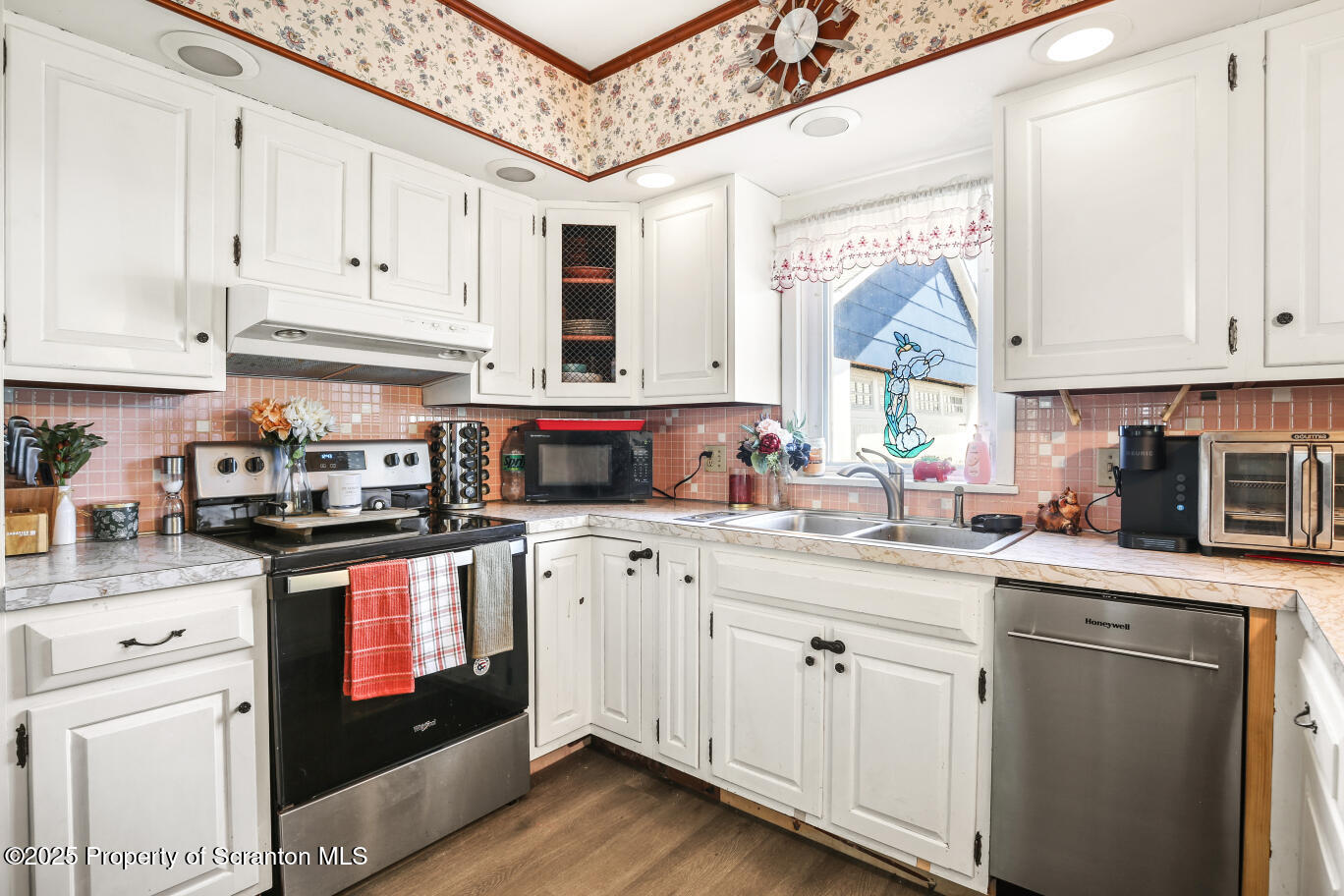 7840 Blue Ridge Trail Mountain Top, PA 18707 - Photo 12 of 20 a kitchen with stainless steel appliances granite countertop a sink a stove and cabinets