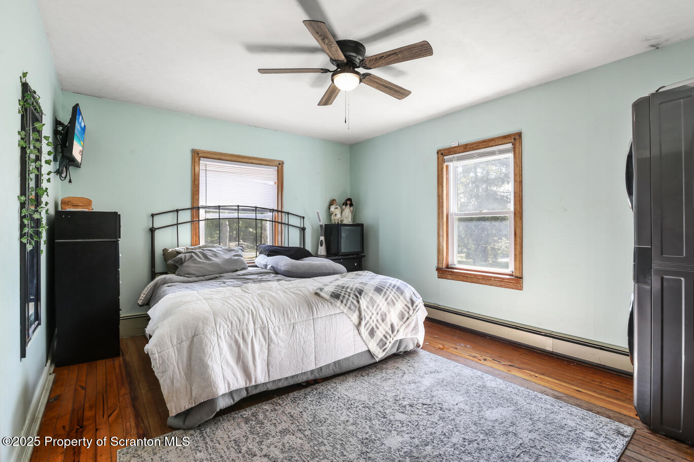 7840 Blue Ridge Trail Mountain Top, PA 18707 - Photo 15 of 20 a bedroom with a bed painting on wall and a window
